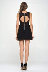 Faux Leather Cut - Out Mini Dress - Wear and Wander