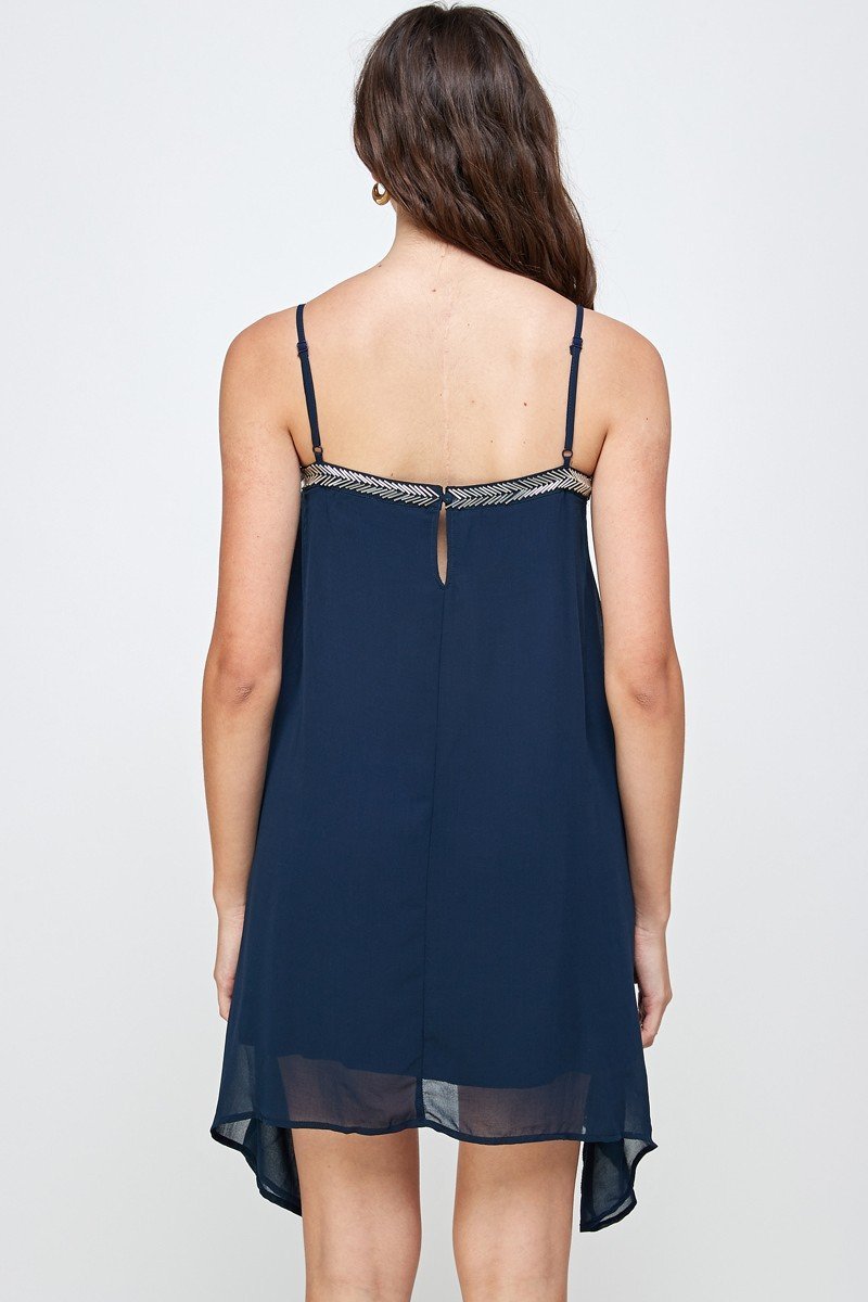 Flowy Sleeveless Mini Dress with Metallic Accents - Wear and Wander